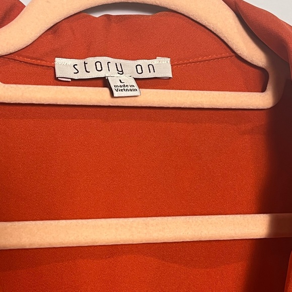 Story on. Sotela Orange Cropped Blazer with Notched Lapels - Picture 2 of 9